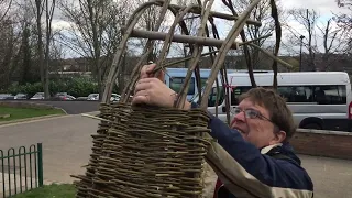 Weaving a willow arch