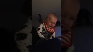 The baby is laughing The baby is smiling Младенец смеётся хохочет улыбается