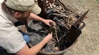 Learning the basics of building a campfire with Greg
