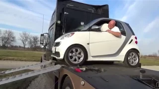 How Does the Smart Car Get on That Big Truck (HDT)?