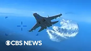 Video shows mid-air confrontation between Russian jets and U.S. drone over Black Sea