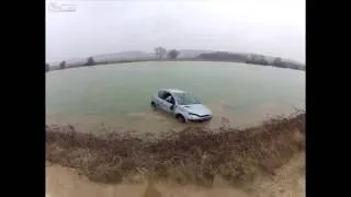 Showing off in a Peugeot ends in a lake. Win or Fail?