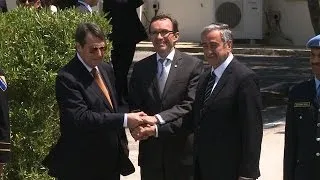 Peace talks in divided Cyprus resume in "climate of optimism"