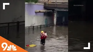 Firefighters rescue children during flash flooding in Denver