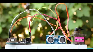 Control servo motor with ultrasonic sensor and arduino