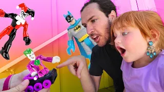 ADLEY vs BATMAN vs THE JOKER!!  Hidden Backyard surprises pretend play with Mom and Dad! hide n seek