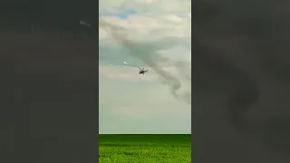 Pair of Ukrainian Mi-24 attack helicopter airstrikes with unguided rockets towards Russian positions