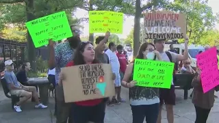 Hundreds of Queens residents stage migrant center protest