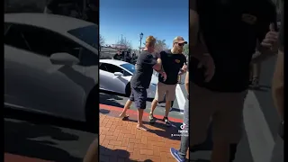 Guy punches Lamborghini for revving at a car meet! Fight breaks out