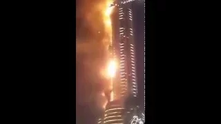 A massive fire in Dubai against the Burj Khalifa Low