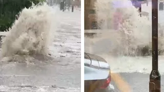 London flash floods: Manhole explodes with water during heavy rain