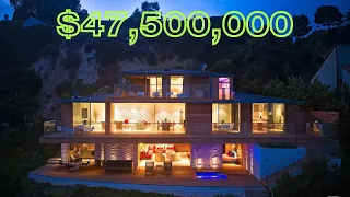 Seaside Elegance: Architectural Masterpiece with 88 Feet of Beach Frontage in Malibu's Paradise Cove