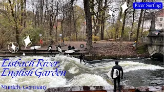 River Surfing at Eisbach River located at English Garden in Munich, Germany