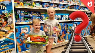 In a toy store / Choosing gifts / Cars or trains