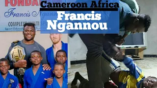 Francis Ngannou rolling with kids from his MMA School in Cameroon, Africa