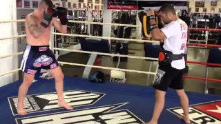 John Wayne Parr smashing Pads at Tristar with Coach Firas Zahabi