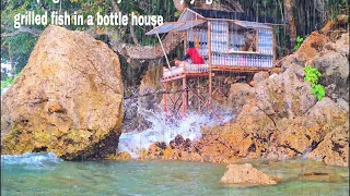 camping in the rainy season enjoying grilled fish in a bottle house