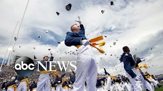 Commencement hat toss, California drought, spiral galaxy: World in Photos, May 27