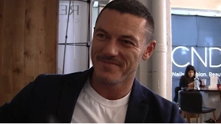 'Beauty and the Beast': Luke Evans Talks New Songs, Josh Gad, and Singing Live on Set