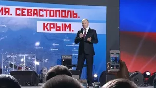 Vladimir Putin campaigns in disputed territory of Crimea