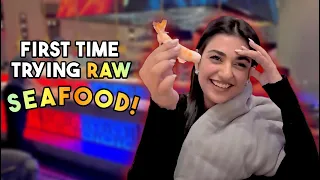 Sarah khan trying raw sea food