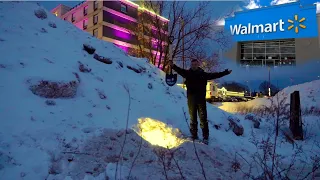 STEALTH CAMPING IN A HUGE SNOW PILE IN A WALMART PARKING LOT - Using Walmart Camping Gear and Food.