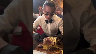 Salt Bae’s $2,500 Gold 24kt Wagyu Tomahawk Steak at Nusr-ET.  Las Vegas Grand opening.