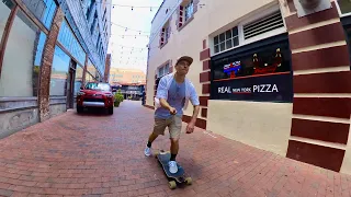 Longboard cruising at Fort Myers Downtown Commercial District