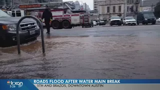 Water main break causes flooding, icy roads on 5th and Brazos