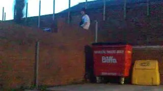 ollie over a huge wall down a massive drop