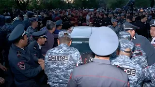 Protests In Armenia Over Azerbaijan Border Deal, Police Push Cars Off The Road
