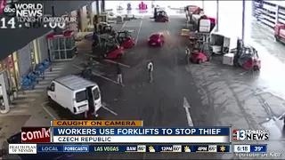 Workers use forklifts to stop thief