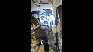 Ukraine gunner crew in action fire a 2S1 Gvozdika self-propelled howitzer