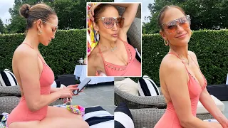 Jennifer Lopez celebrates Fourth of July at the poolside in plunging swimsuit
