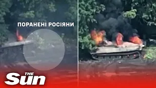 Russian soldiers flee from BURNING TANK after it it stuck by Ukrainian Artillery