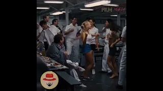 Margot Robbie Dancing With Sailors in Wolf of Walstreet