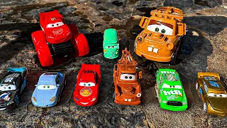 Looking for Disney Pixar Cars On the Rocky Road : Lightning McQueen, Mater, Dinoco McQueen, Mack