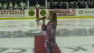 Chloe sings National Anthem at Oilers Hockey Game