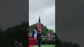 PM Modi and President Biden stand in honor of the national anthems