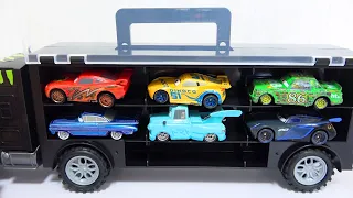 12 type Disney Cars Tomica. mcqueen & black truck