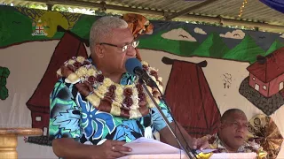 Fijian Prime Minister Hon. Bainimarama hands over bonus cheques to pine landowners.