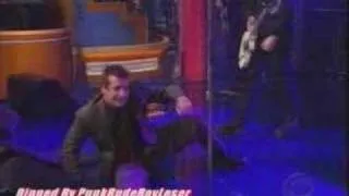 Tre Cool falls off stage