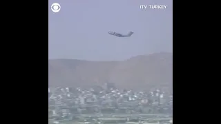 French Air Force A400M dispensing flares as it departs Kabul Airport