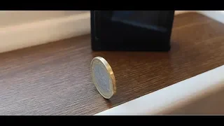 Chinese high-speed train coin balancing at 348km/h