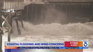 Storm-driven winds kick up high seas in Southern California, prompting concerns over coastal floodin