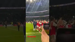 Arsenal fans against Arsenal players after winning again Tottenham