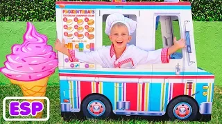 Vlad y Nikita jugando con un camión de reparto de helados
