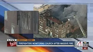 Firefighters monitoring church after massive fire