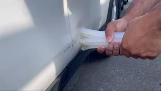 Paint less dent removal with glue sticks