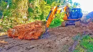 PUSHING BIG ROCK CATERPILLAR 320D||DETOUR PREPARATION FOR BOX CULVERT INSTALLATION